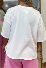 Load image into Gallery viewer, STARS IN YOUR EYES WHITE PATCHWORK TOP **SHIPPING EXPECTED TO BEGIN ON DATE 5/12**