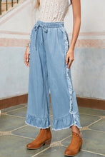 Load image into Gallery viewer, MICKIE LIGHT WASH WIDE RUFFLE LEG JEANS **SHIPPING EXPECTED TO BEGIN ON DATE 3/30**
