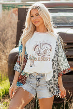 Load image into Gallery viewer, Asymmetric Printed Patchwork Sleeve Peace Desert Graphic Top
