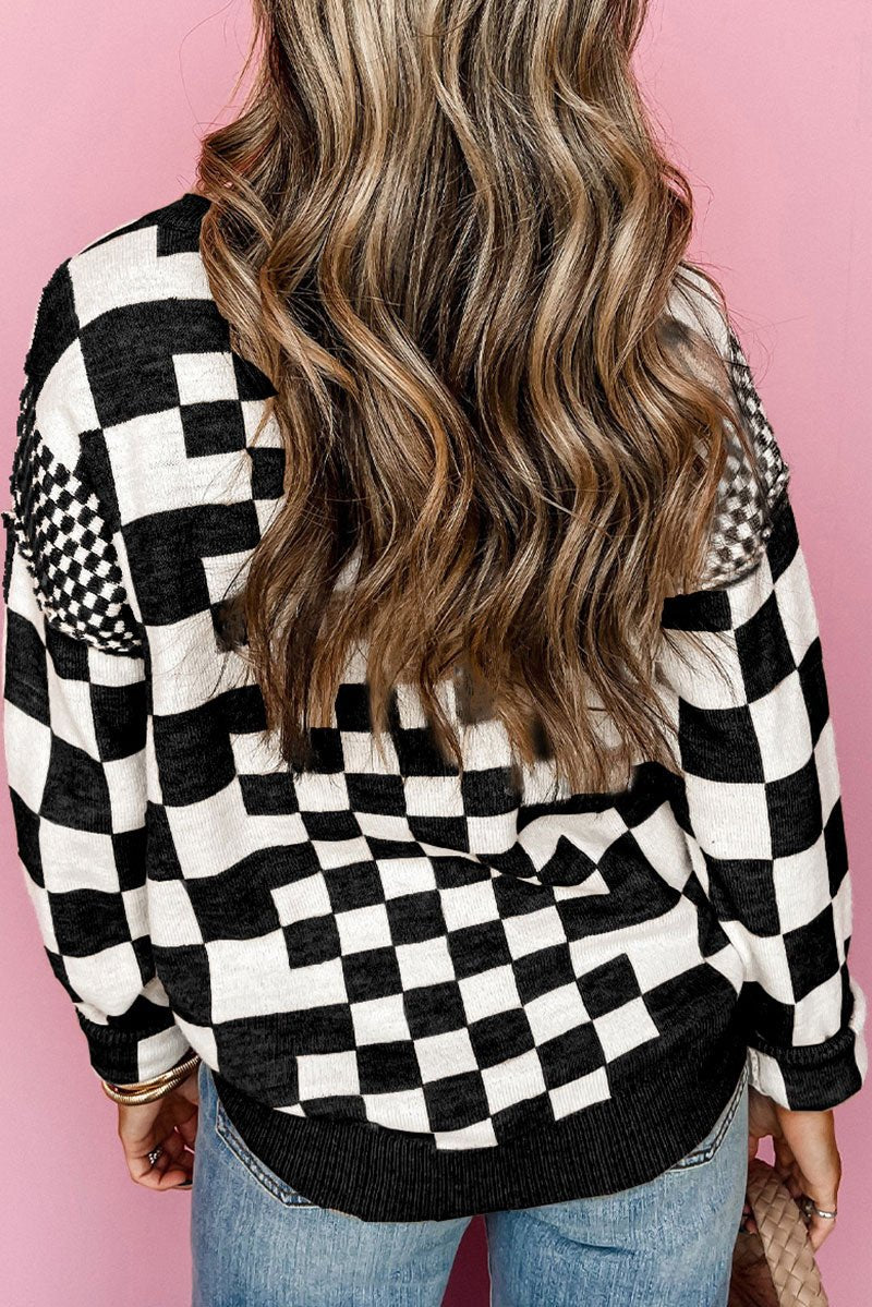 CHECK MATE BLACK CHECKERED SWEATER **SHIPPING EXPECTED TO BEGIN ON DATE 8/30**