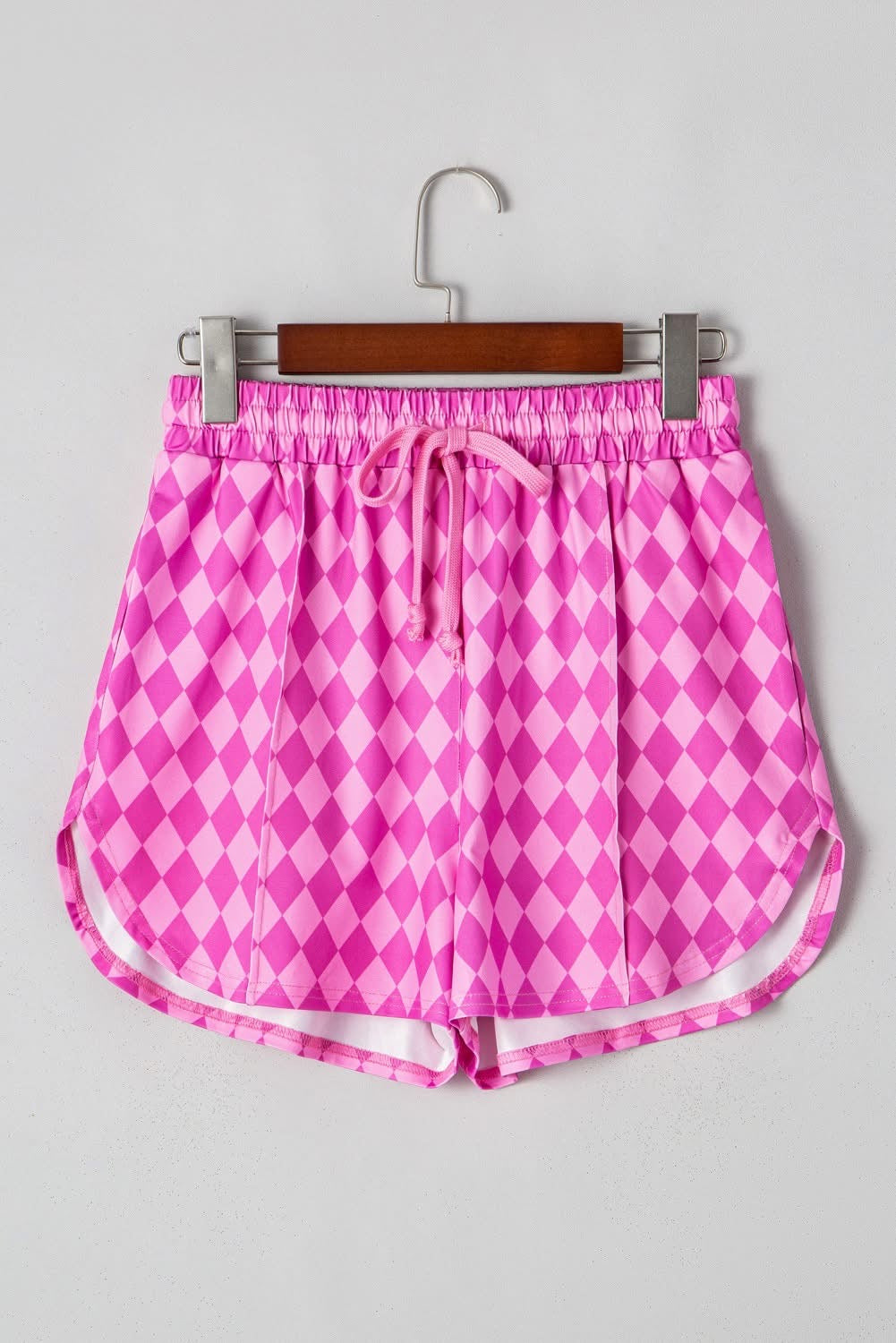 Pink Geometric active shorts ( slits)