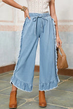 Load image into Gallery viewer, MICKIE LIGHT WASH WIDE RUFFLE LEG JEANS **SHIPPING EXPECTED TO BEGIN ON DATE 3/30**
