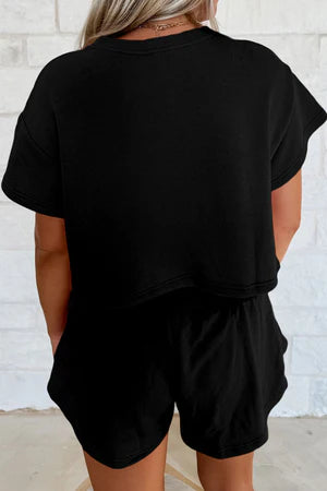 JOIN THE CLUB BLACK CROPPED TEE & HIGH WAIST RUFFLE SKORT SET **SHIPPING EXPECTED TO BEGIN ON DATE 4/16**
