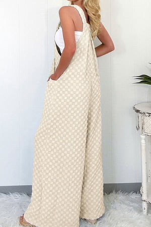 CHECK OFF ALL THE BOXES BEIGE JUMPSUIT **SHIPPING EXPECTED TO BEGIN ON DATE 4/8**