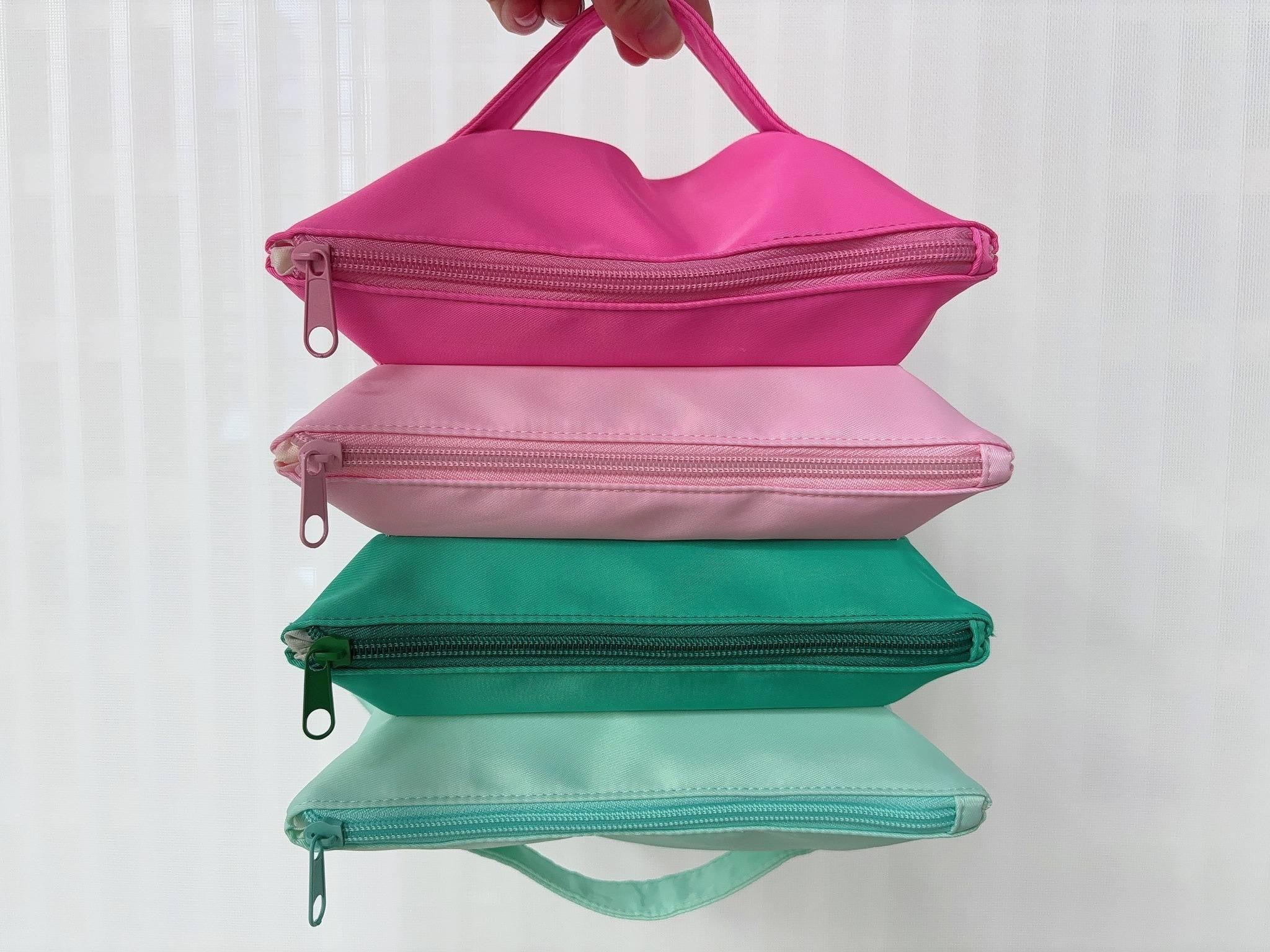 Four Zipped Pocket Accordian Bag
