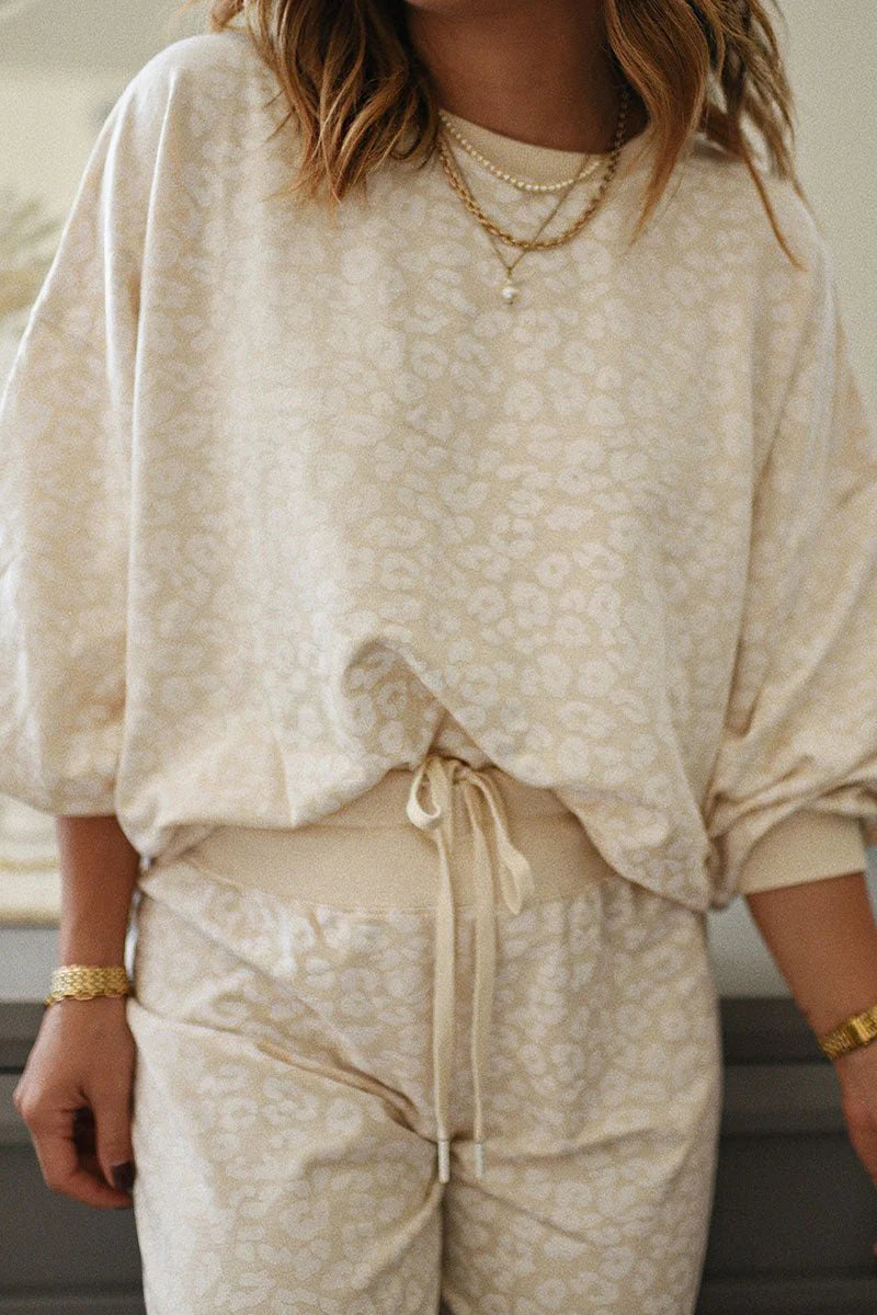 WHITE LEOPARD PRINT TOP AND PANTS LOUNGE SET **SHIPPING EXPECTED TO BEGIN ON DATE 8/30**