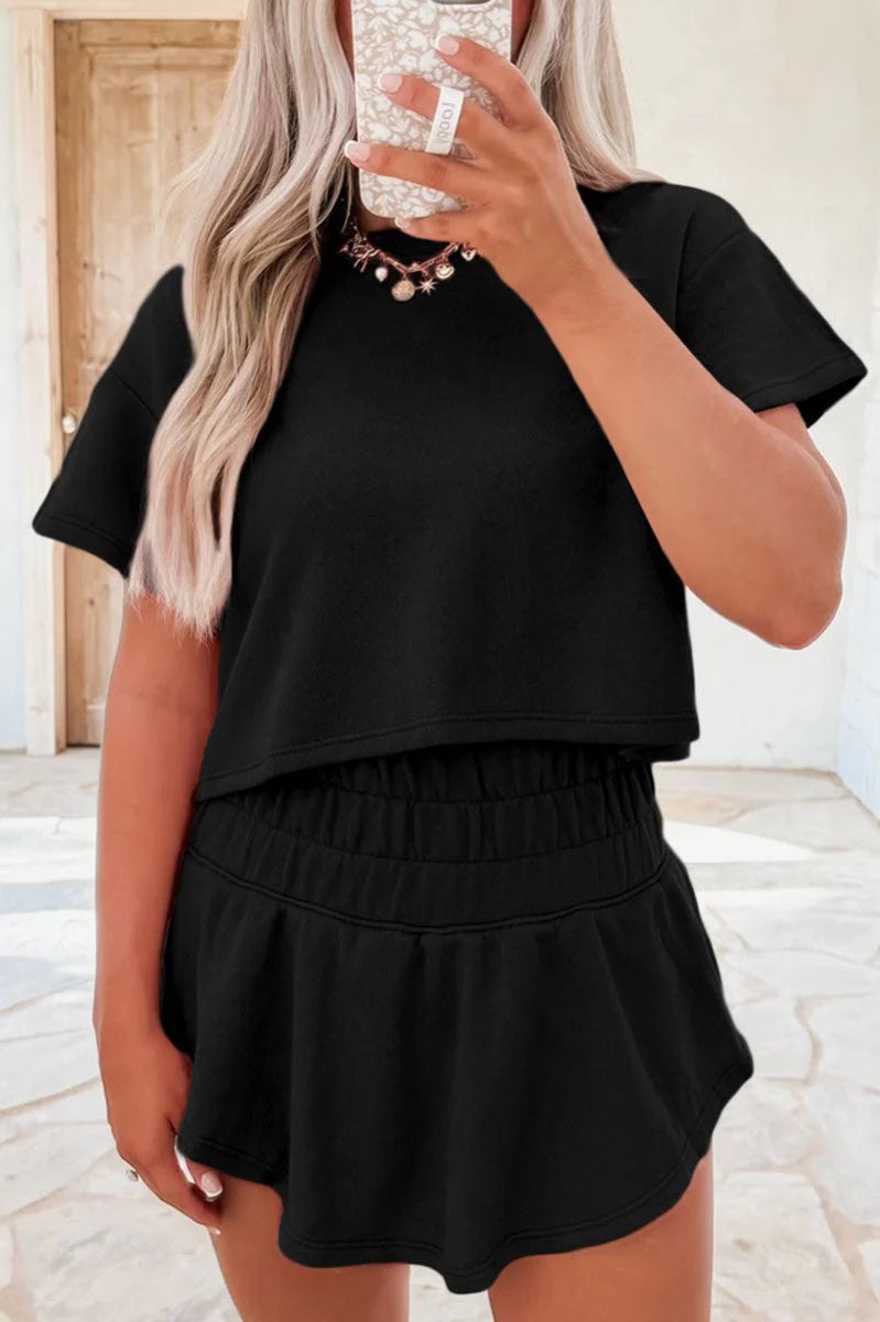 JOIN THE CLUB BLACK CROPPED TEE & HIGH WAIST RUFFLE SKORT SET **SHIPPING EXPECTED TO BEGIN ON DATE 4/16**