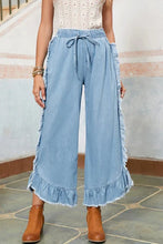 Load image into Gallery viewer, MICKIE LIGHT WASH WIDE RUFFLE LEG JEANS **SHIPPING EXPECTED TO BEGIN ON DATE 3/30**
